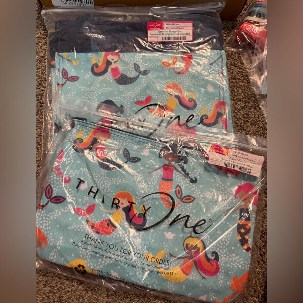 Thirty-One Mermaid Design Pouches with Blue Background